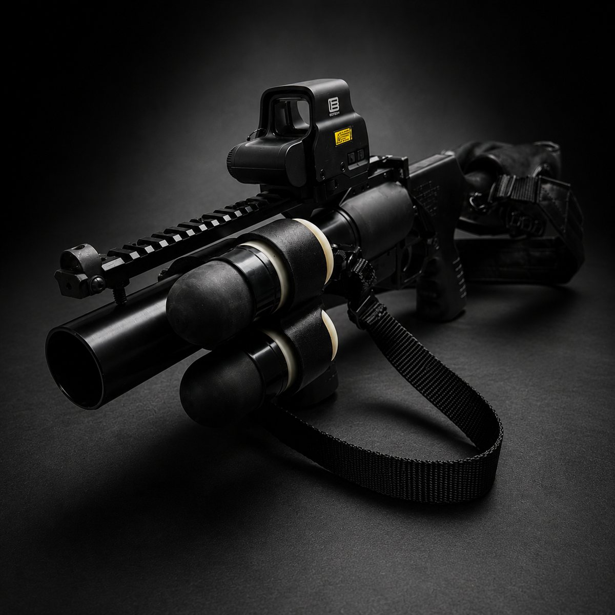 40mm Double Shell Caddy mounted on an LMT launcher, two rounds loaded and ready for a fast follow-up shot